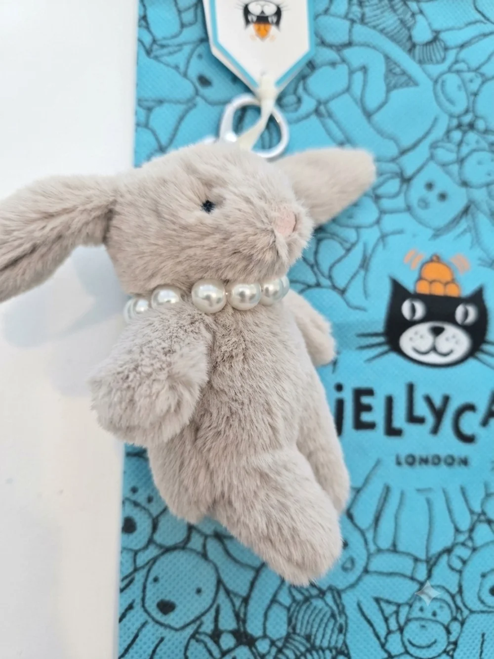 Jellycat Beige Bunny Bag Charm with Pearl Collar